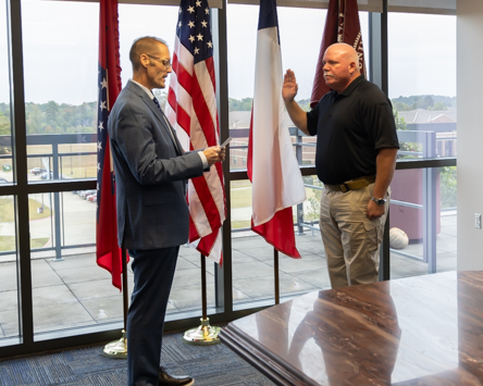 Officer Pete Mann being sworn in.