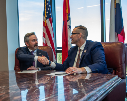 Jason Adams, CHRISTUS St. Michael Health Systems & A&M-Texarkana President Ross Alexander shaking hands