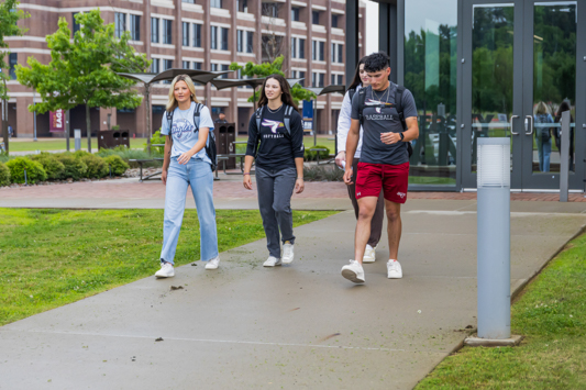 Photo of students walking on campus